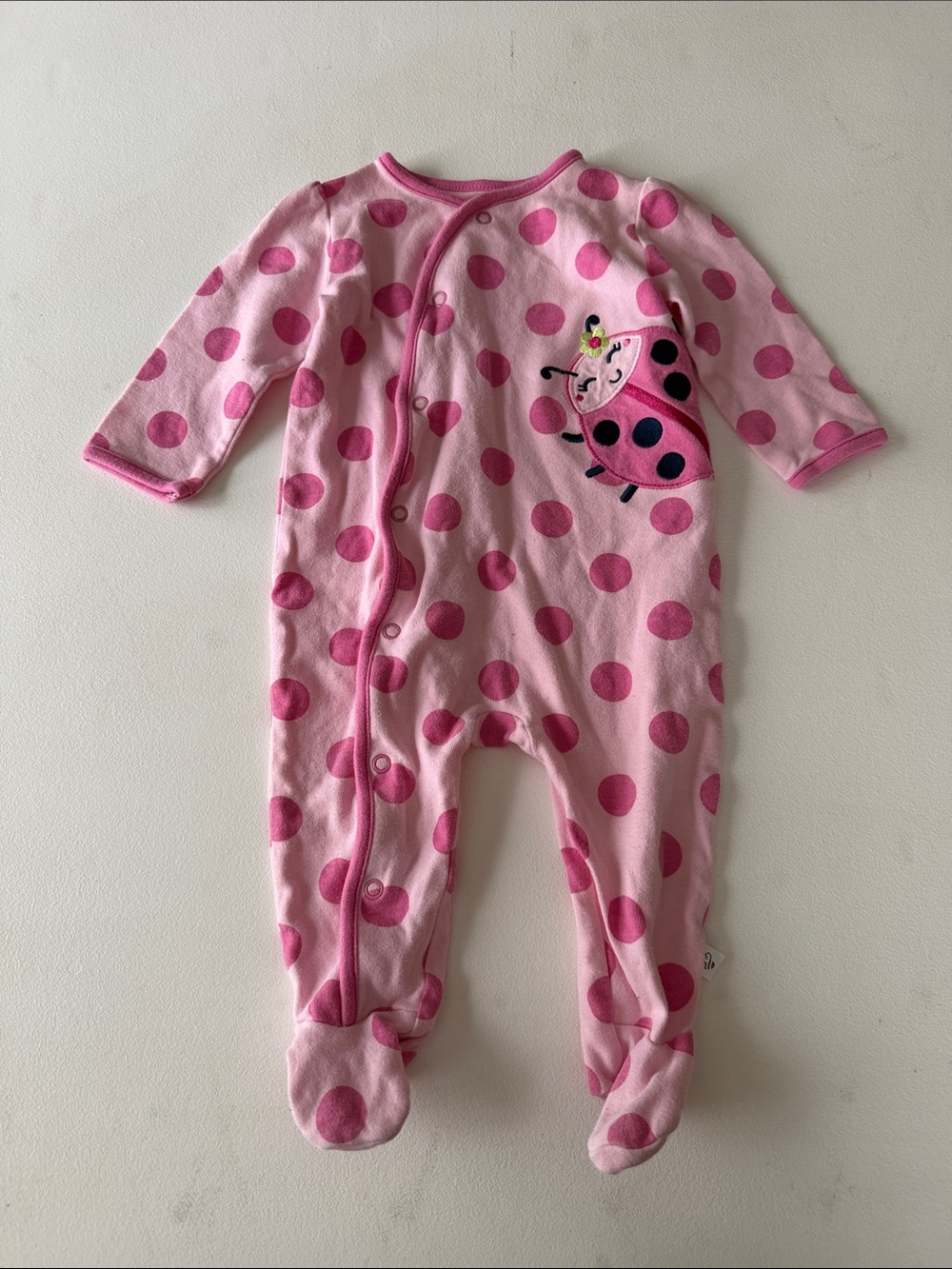 First Moments - Baby Pink Polka Dot One-Piece with Ladybug Applique